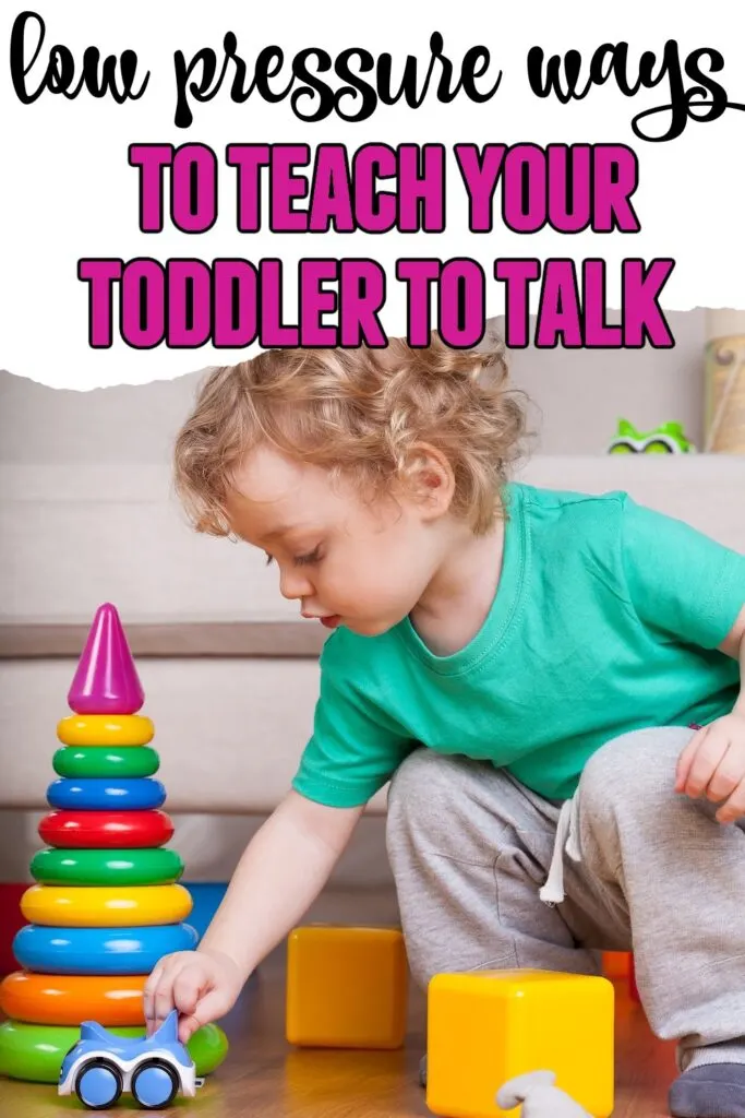 toddler playing with toys with text overlay:low pressure ways to teach your toddler to talk