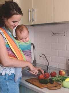 mom cooking with baby