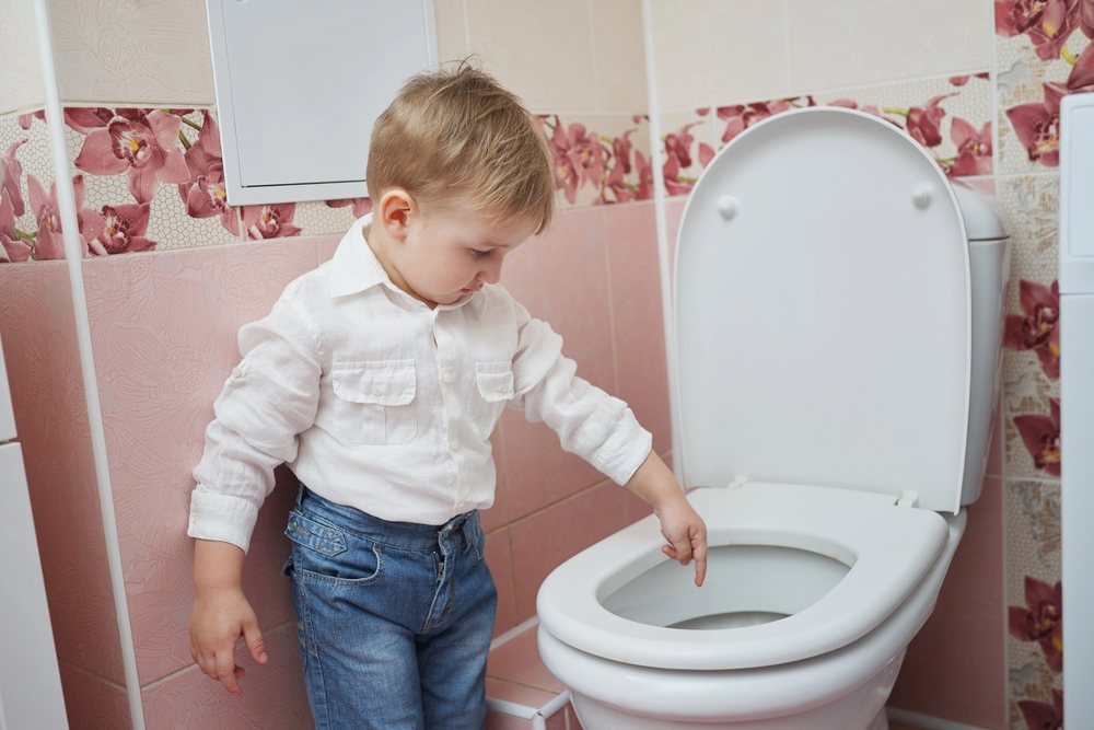 toddler pointing in potty